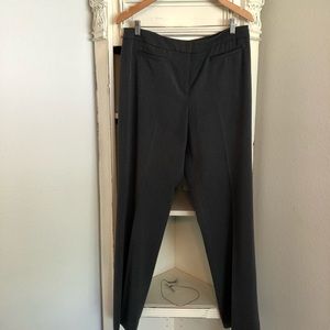 Anne Klein stretch.  Front pockets still sealed, no rear pockets for clean look.